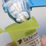 Permalink to How Can We Help You Today? pills being poured into a bottle